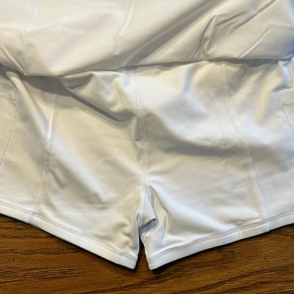 FlirTee Asymmetrical Pleated Golf Skirt White/Envy Green Stripes - Picture 11 of 16